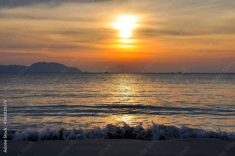 Fototapeta premium Sunset background on the sea coast