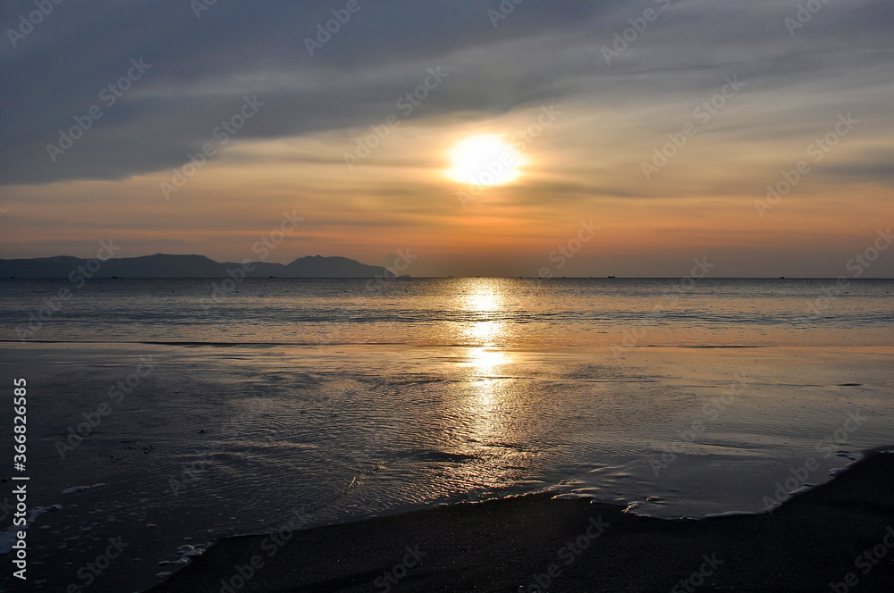 Sunset background on the sea coast
