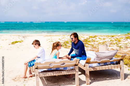 Father with kids at beach © BlueOrange Studio