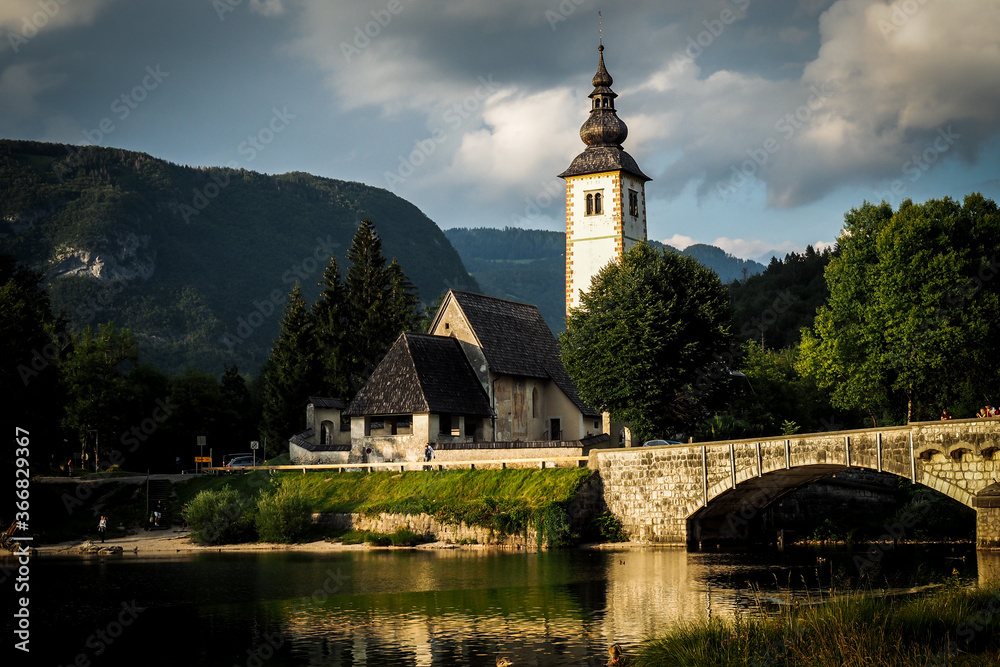 Church of Sv. John the Baptist and a bridge by the Bohinj lake, Slovenia