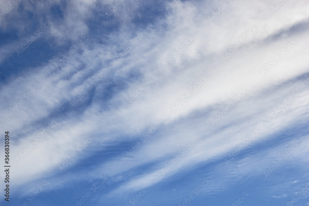 Blue sky background with white high clouds Altostratus, Cirrocumulus, Cirrus.