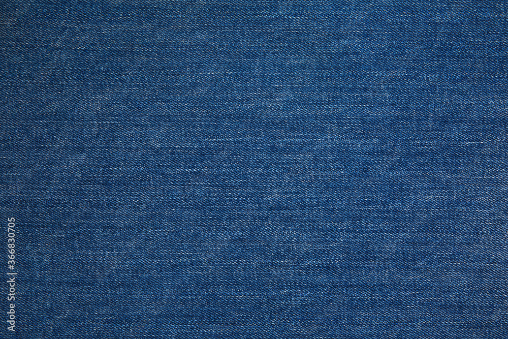 Texture of dark grated denim as background. Close-up Texture of dark grated denim as background. Close-up
