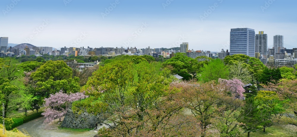 View of Fukuoka skyline from the ruins of Maizuru castle. Fukuoka city, Japan. 04-07-2015 View of Fukuoka skyline from the ruins of Maizuru castle. Fukuoka city, Japan. 04-07-2015