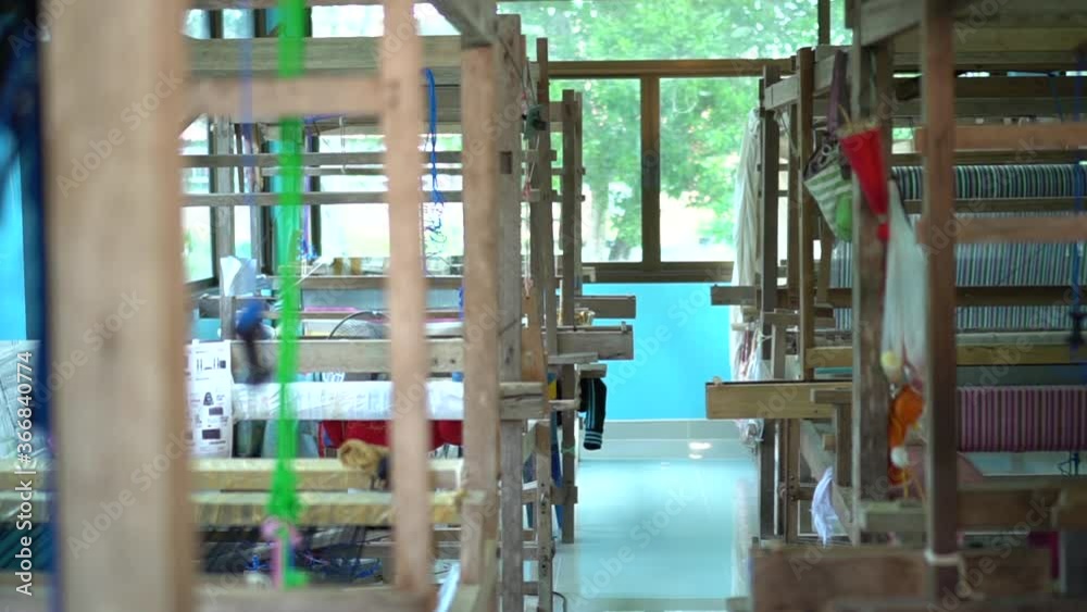 The process of making Thai fabrics Is a traditional handicraft The process of making Thai fabrics Is a traditional handicraft