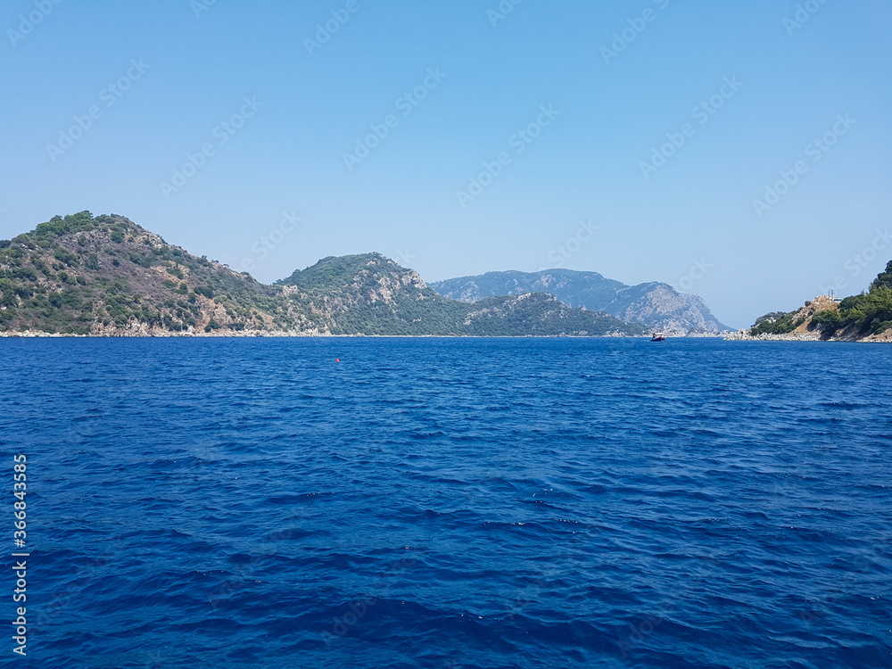 mountains by the sea, mountain ranges and rocks, seascapes, blue sky mountains by the sea, mountain ranges and rocks, seascapes, blue sky