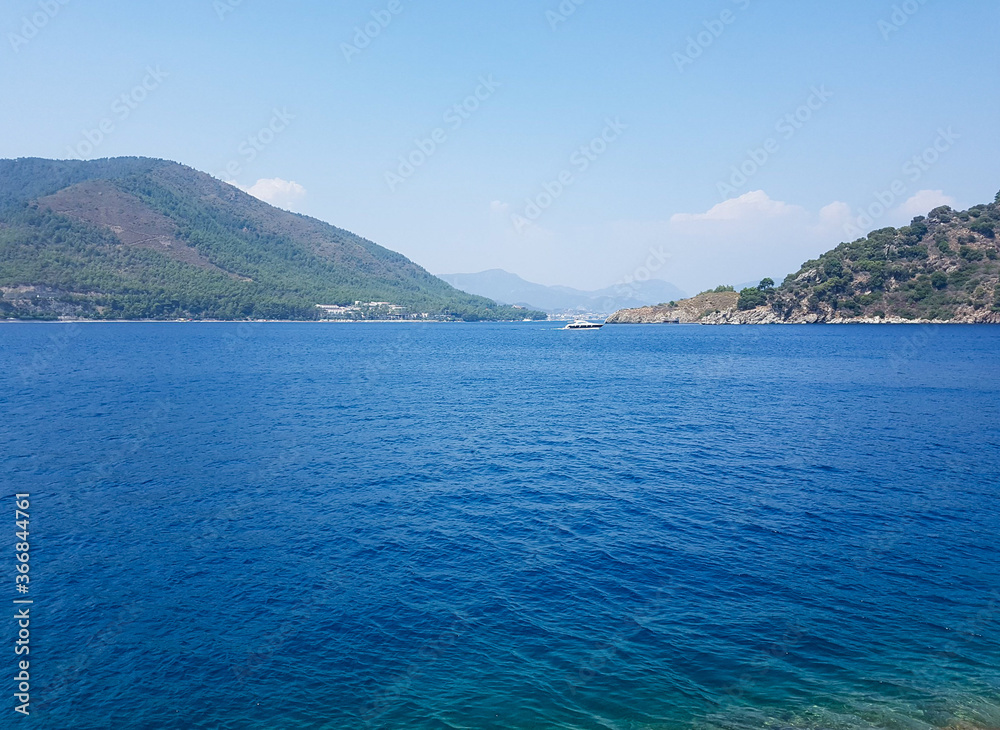 mountains by the sea, mountain ranges and rocks, seascapes, blue sky