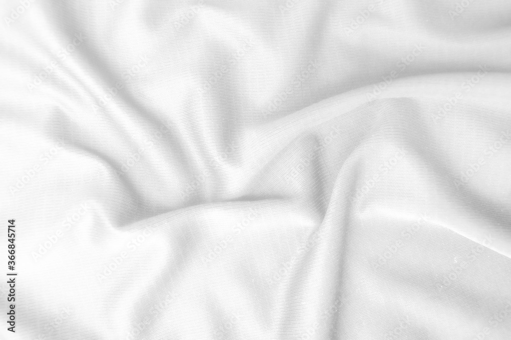 Abstract white fabric texture background. Wavy white cloth.