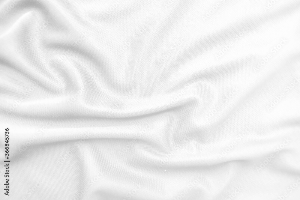 Abstract white fabric texture background. Wavy white cloth.