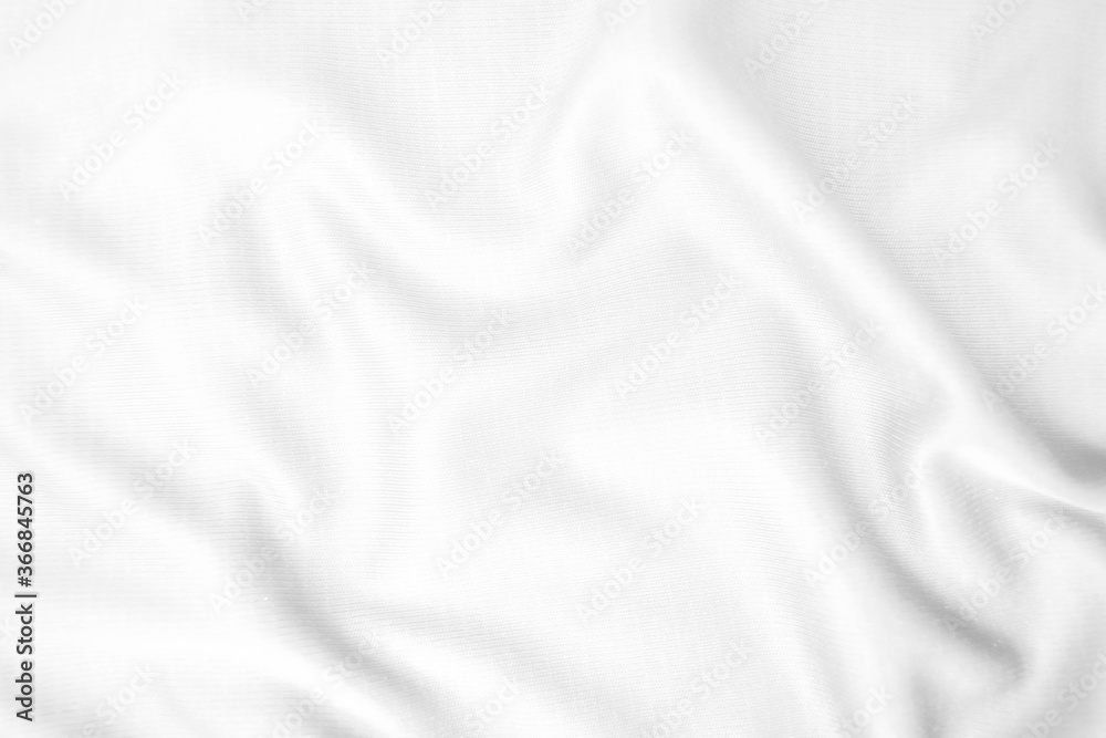 Abstract white fabric texture background. Wavy white cloth.