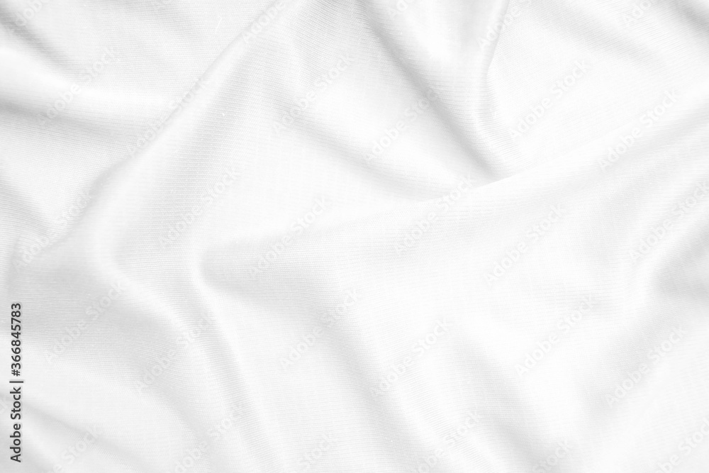 Abstract white fabric texture background. Wavy white cloth.