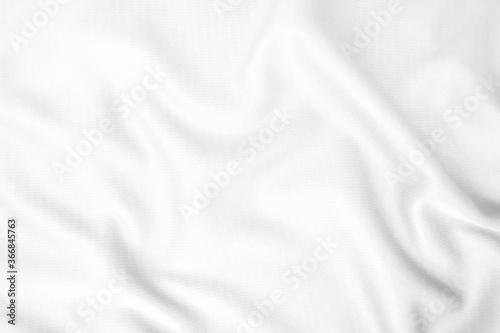 Abstract white fabric texture background. Wavy white cloth.