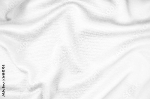 Abstract white fabric texture background. Wavy white cloth.