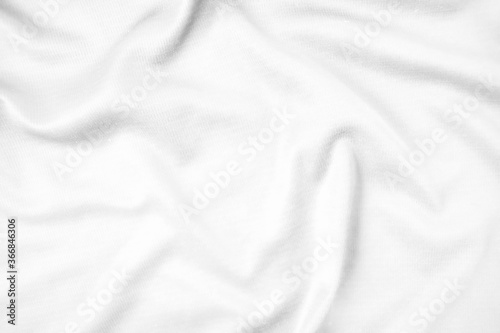 Abstract white fabric texture background. Wavy white cloth.