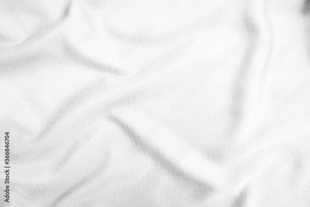 Abstract white fabric texture background. Wavy white cloth.