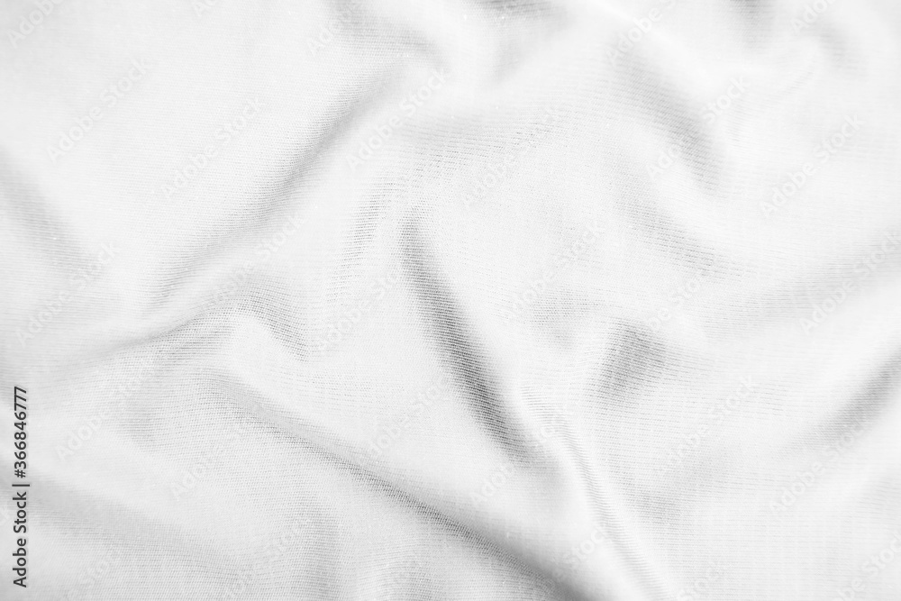 Abstract white fabric texture background. Wavy white cloth.