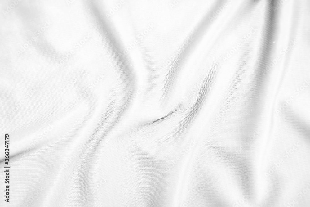 Abstract white fabric texture background. Wavy white cloth.