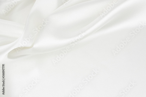 White satin fabric with gentle curves