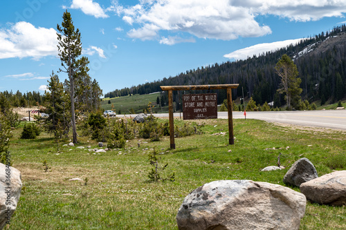 Cooke City, Montana - July 2, 2020: The famous Top of the World Store, a gift shop with Beartooth Highway themed souvenirs - sign for the shop photo