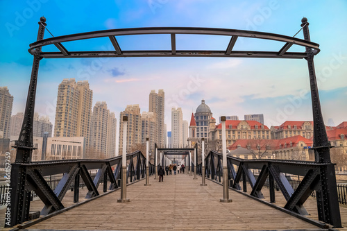 Tianjin  China - Jan 16 2020  Tianjin  pedestrian wooden bridge over Haihe river in Nankai district