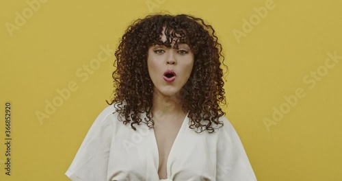 Frustrated and disappointed picky, ignorant young woman, grimacing from disgust and disappointment, raise hands in dismay, make stop and rejecting bothering offer. What. 4K.