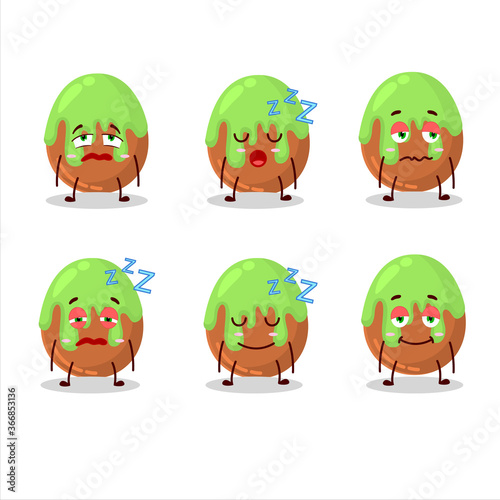 Fototapeta Naklejka Na Ścianę i Meble -  Cartoon character of choco green candy with sleepy expression