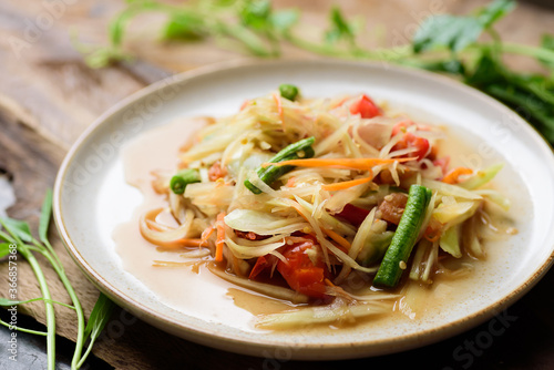 Thai food, Spicy papaya salad (Som Tum) on plate