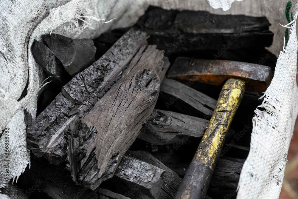 Fototapeta premium axe and charcoal