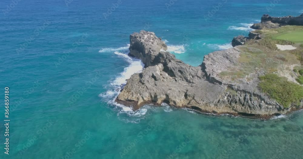 Incredible shot of the rocks where the waves break in Macao, Punta Cana, beautiful turquoise blue sea. Incredible shot of the rocks where the waves break in Macao, Punta Cana, beautiful turquoise blue sea.