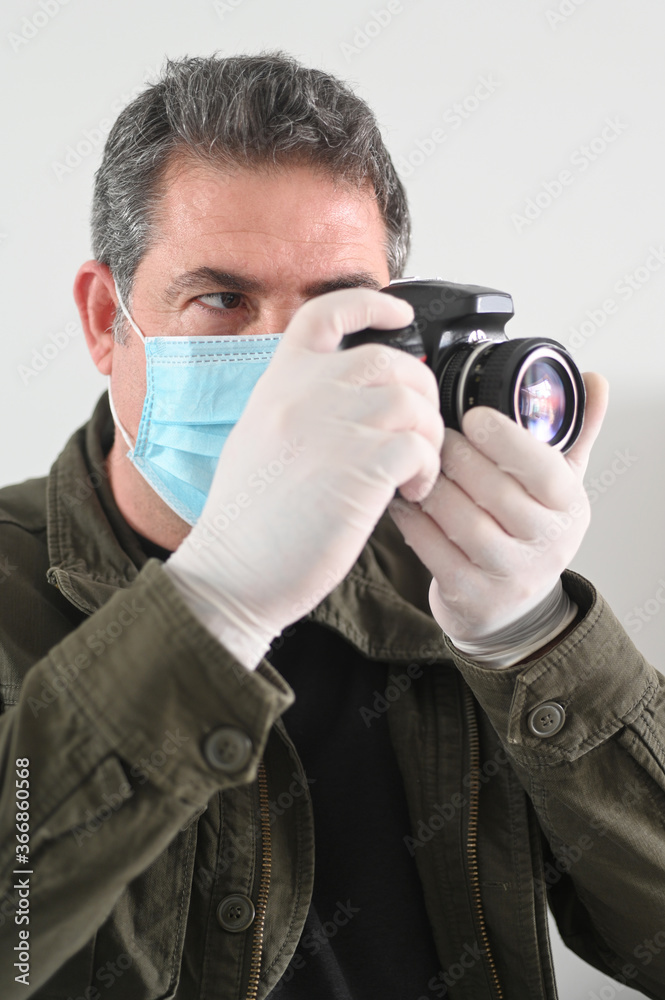 Photojournalist photographing the Coronaviruse pandemic (COVID-19 ) outbreak Photojournalist photographing the Coronaviruse pandemic (COVID-19 ) outbreak