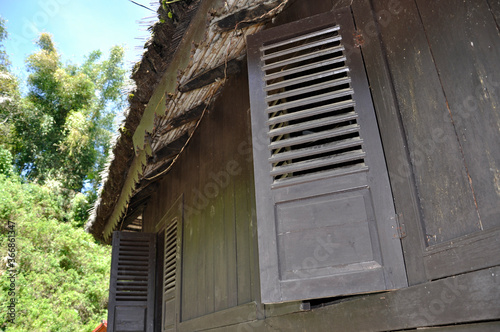 WEST SUMATERA, INDONESIA -JUNE 8, 2014: Architectural detail and woodcraft at Tuo Kayu Jao Mosque in West Sumatra, Indonesia. Built-in 1599 and is the second oldest mosque in Indonesia. photo