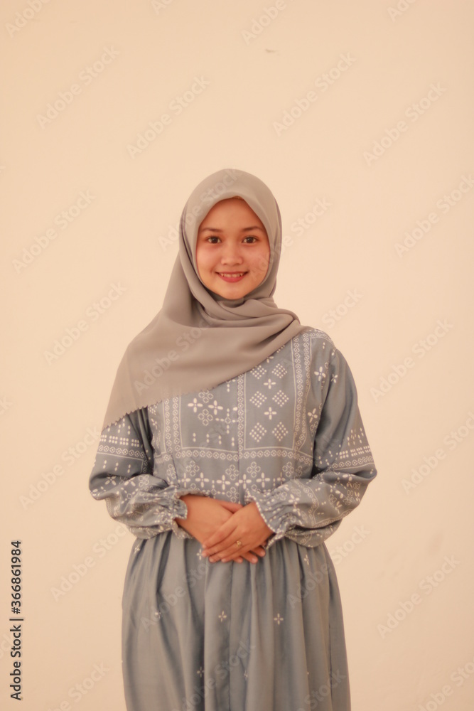 Fashion portrait of young beautiful asian muslim woman with wearing hijab Fashion portrait of young beautiful asian muslim woman with wearing hijab