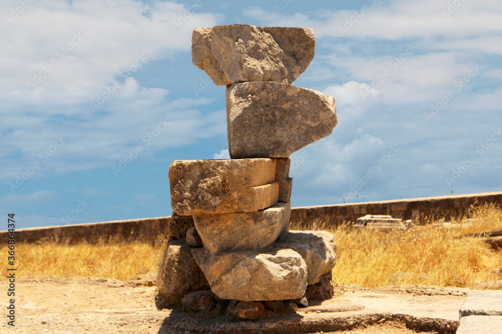 Stone bases of statues, the Acropolis of Lindos, Greece. The