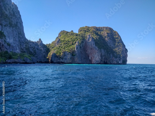 Tall limestone cliff rocks structure in Koh Phi Phi Island Thailand.