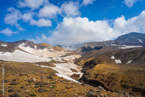 Nature, colourful snowy mountains and active volcanoes of Kamchatka
