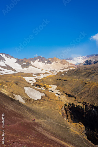Nature, colourful snowy mountains and active volcanoes of Kamchatka