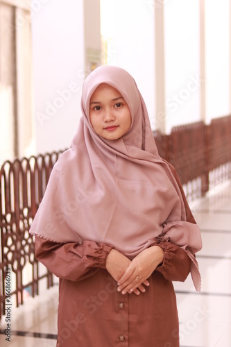 Fashion portrait of young beautiful asian muslim woman with wearing hijab