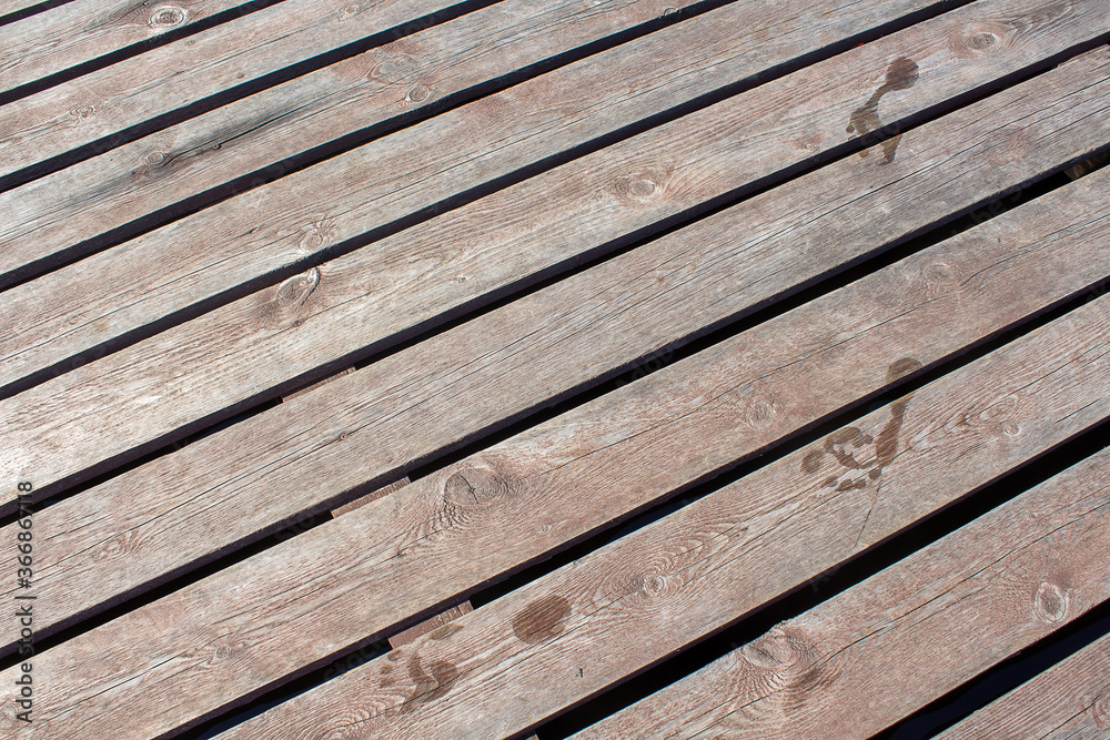 Wet child footprint on brown wooden background. Wet child footprint on brown wooden background.
