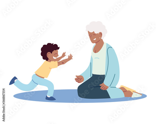 grandmother and grandson together smiling at home