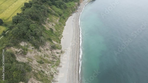 Wallpaper Mural Beautiful Paradise With Turquoise Blue Sea And Lush Trees In Greystones South Beach, Ireland - aerial Torontodigital.ca