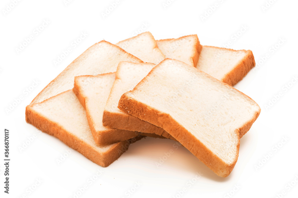 milk bread on white background, homemade slide bread on the wooden broad, Sliced bread isolated on a white background. Bread slices and crumbs viewed from above. Top view