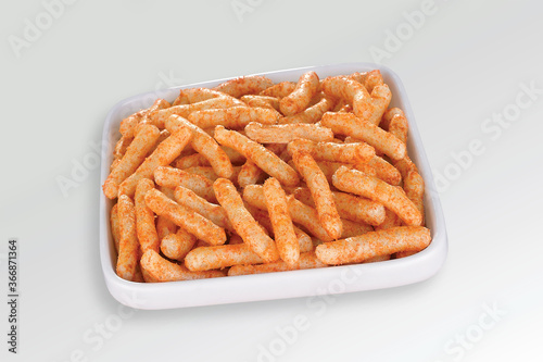 Fried and Spicy Stick, Sali Sev, noodles, Snacks or Fryums (Snacks Pellets) White background. selective focus - Image photo