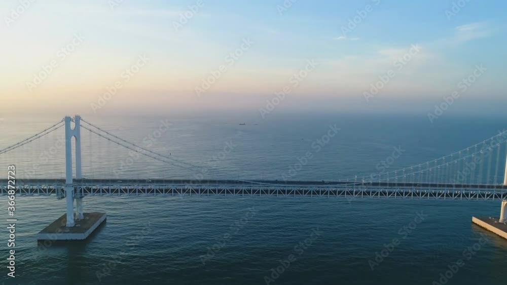 Gwangan Bridge and Haeundae aerial view at Sunrise, Busan, South Korea Gwangan Bridge and Haeundae aerial view at Sunrise, Busan, South Korea