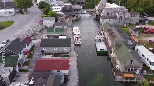 Leland Historic District - Historic Fishtown In Leland, Michigan With Boats On The Coast Of Lake Michigan. - aerial drone photo