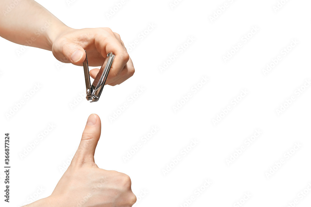 Man do manicure at home. Self hand routine. Copy space for text. Male finger procedure. White background isolated. Copyspace. Thumb fingernail clean. Man manicurist service. Horizontal Man do manicure at home. Self hand routine. Copy space for text. Male finger procedure. White background isolated. Copyspace. Thumb fingernail clean. Man manicurist service. Horizontal