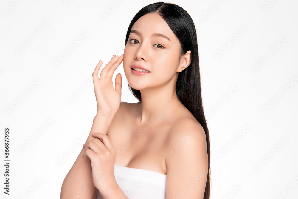 Beauty face. Smiling asian woman touching healthy skin portrait. Beautiful happy girl model with fresh glowing hydrated facial skin and natural makeup on white background, Beauty face. Smiling asian woman touching healthy skin portrait. Beautiful happy girl model with fresh glowing hydrated facial skin and natural makeup on white background,