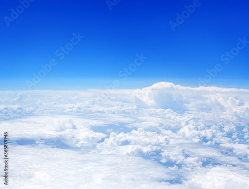 Fototapeta Naklejka Na Ścianę i Meble -  White cumulus clouds clear blue sky background aerial cloudscape panoramic above view high azure skies panorama fluffy cloud texture backdrop, sunny heaven cloudy weather flight landscape, ozone layer