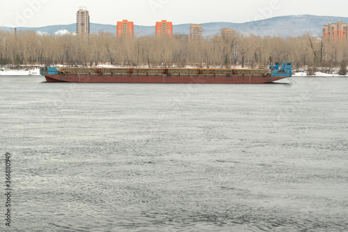 фотографія An old river barge at the roadstead