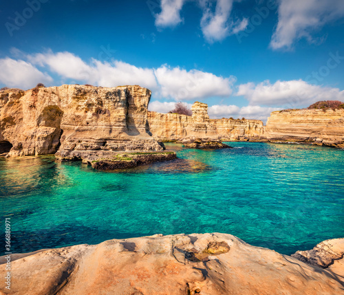 Incredible summer view of popular tourist attraction - Torre Sant'Andrea. Exotic morning seascape of Adriatic sea, Torre Sant'Andrea village location, Apulia region, Italy, Europe.
