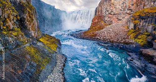 View from down of canyon of most powerful waterfall in Europe - Dettifoss. Fabulous summer scene of Jokulsargljufur National Park, Iceland.