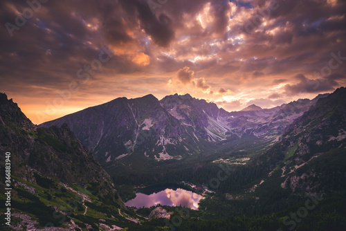 Sunset in High Tatras mountains national park. Mountain popradske lake in Slovakia. photo